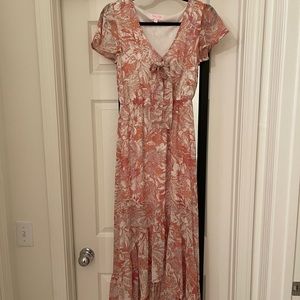 Pink lily midi dress with tags. Size small.